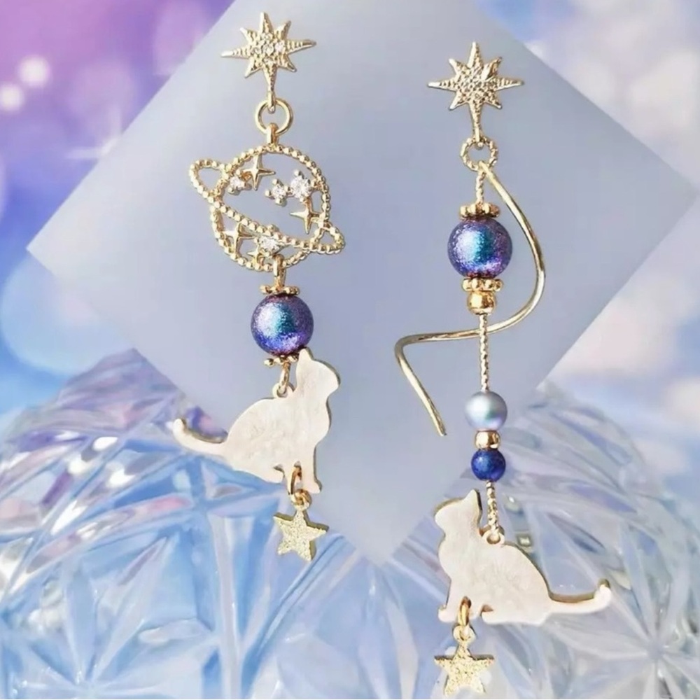 Cat space dangling earrings